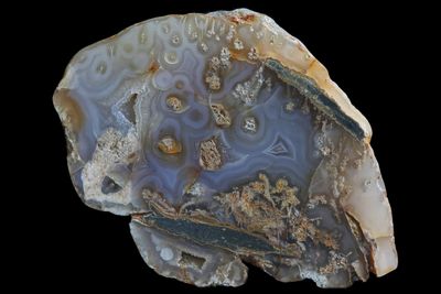 Agate with multiple centres with Mossy inclusions & two small Crystalline Geode in it