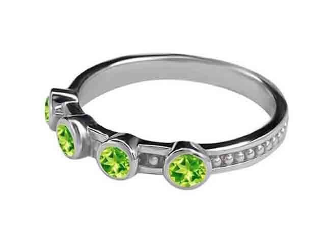 SILVER 4-PERIDOT RING - SIZE 9