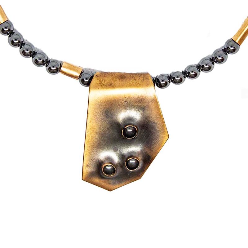 COPPER PUNCH HOLE HEMATITE NECKLACE