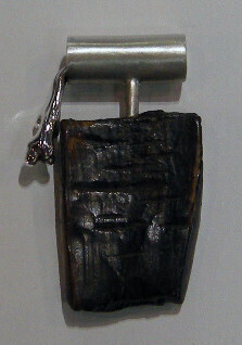 SS BRUSHED PENDANT W/MASTODON ARTIFACT