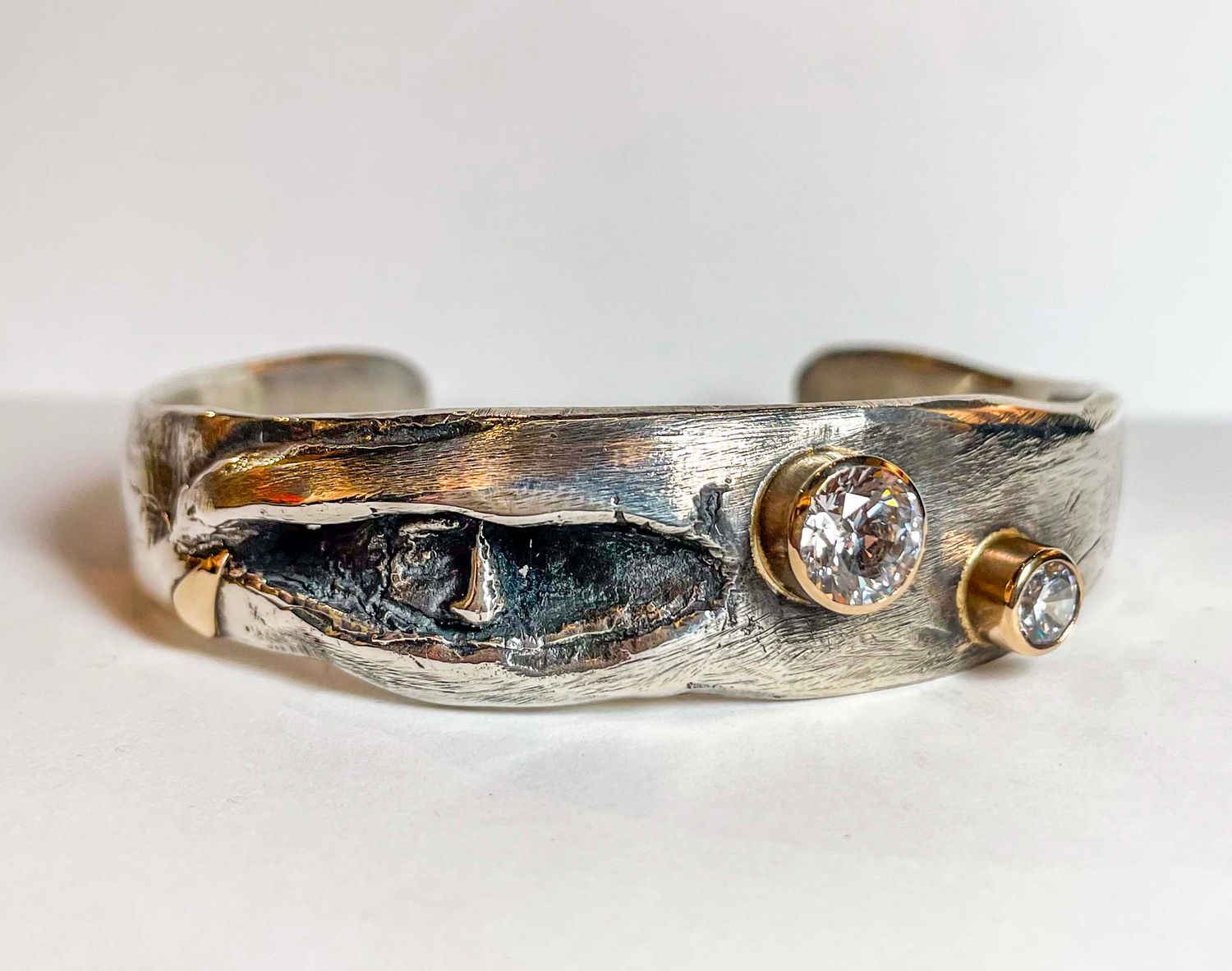 SS/14KT THE TEAR BRACELET W/10MM &amp; 6MM CZ