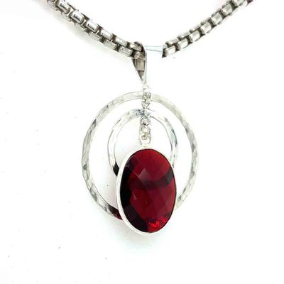 SILVER DOUBLE HAMMERED CIRCLES W/GARNET PENDANT