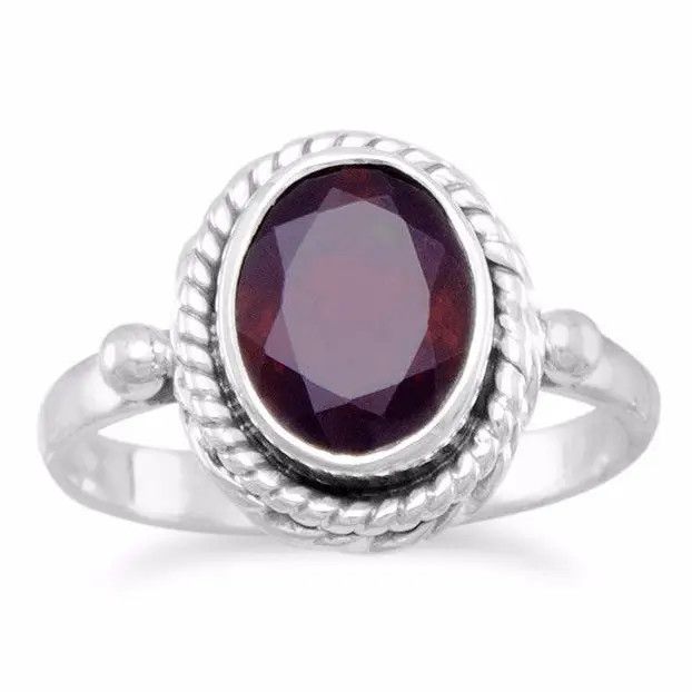 SILVER OVAL FACETED GARNET RING 8