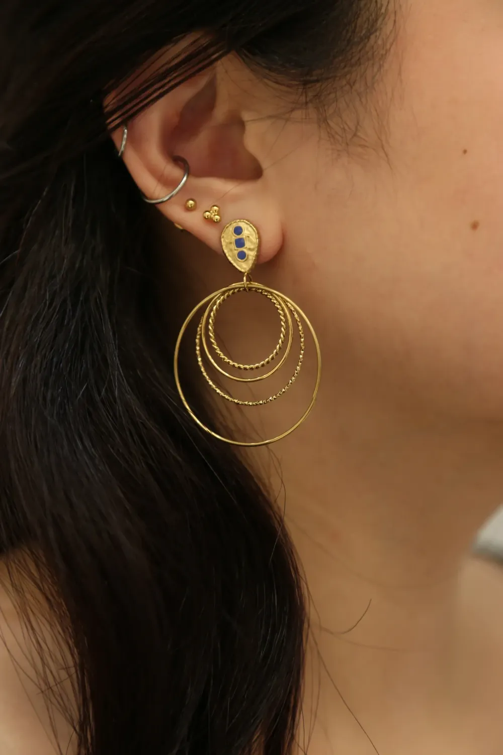 Boucles d'oreilles avec pierre bleu