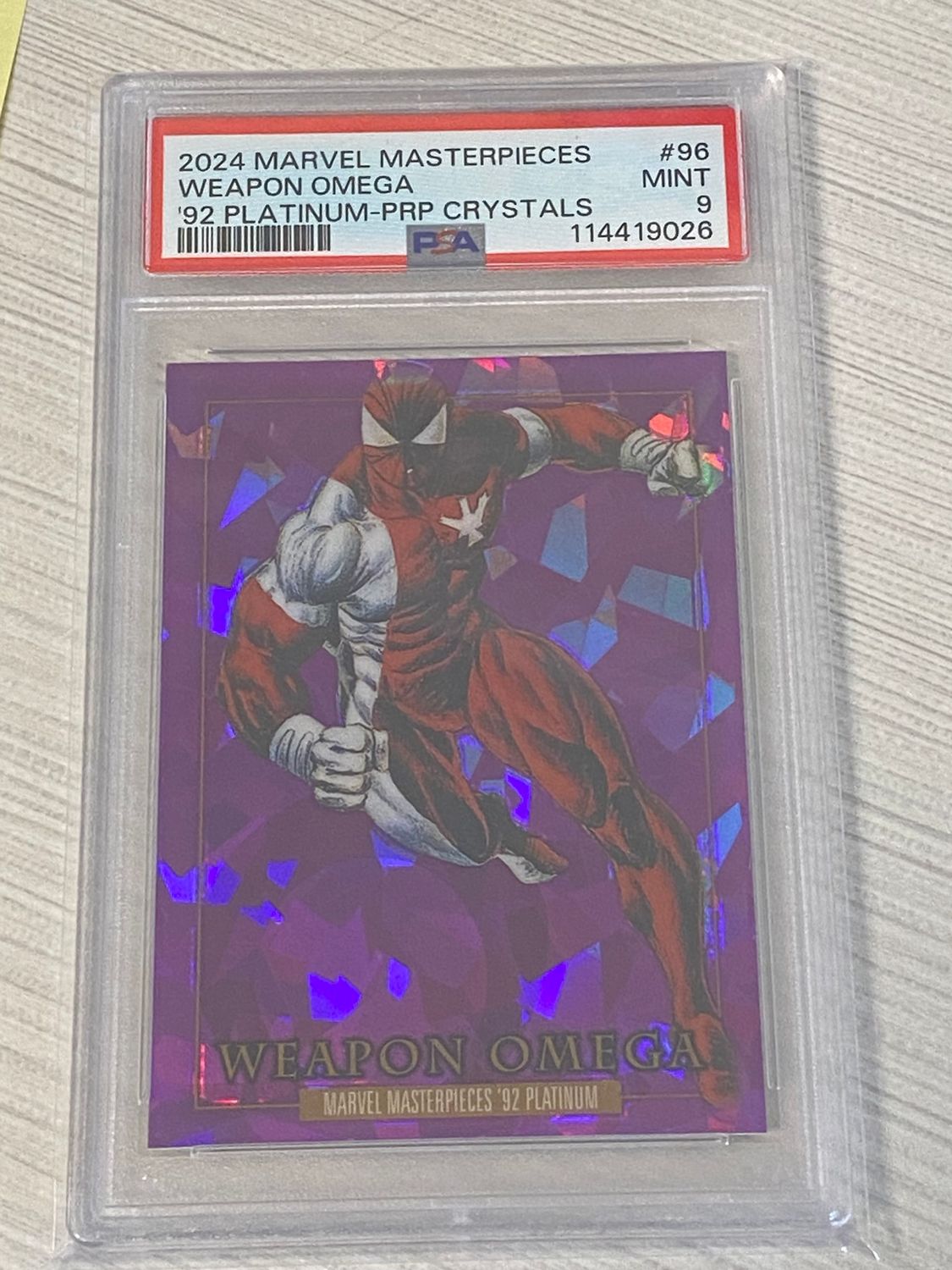 2024 Marvel Masterpieces Weapon Omega #96 '92 Platinum-PRP Crystals PSA 9 Mint