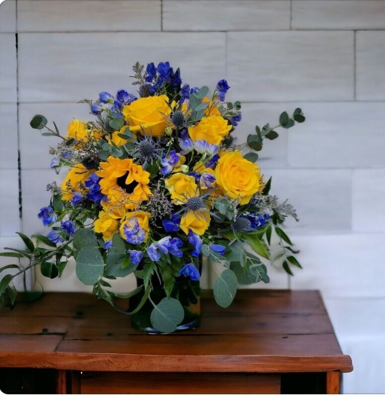 Sunshine Blooms: Radiant Sunflower Floral Arrangement