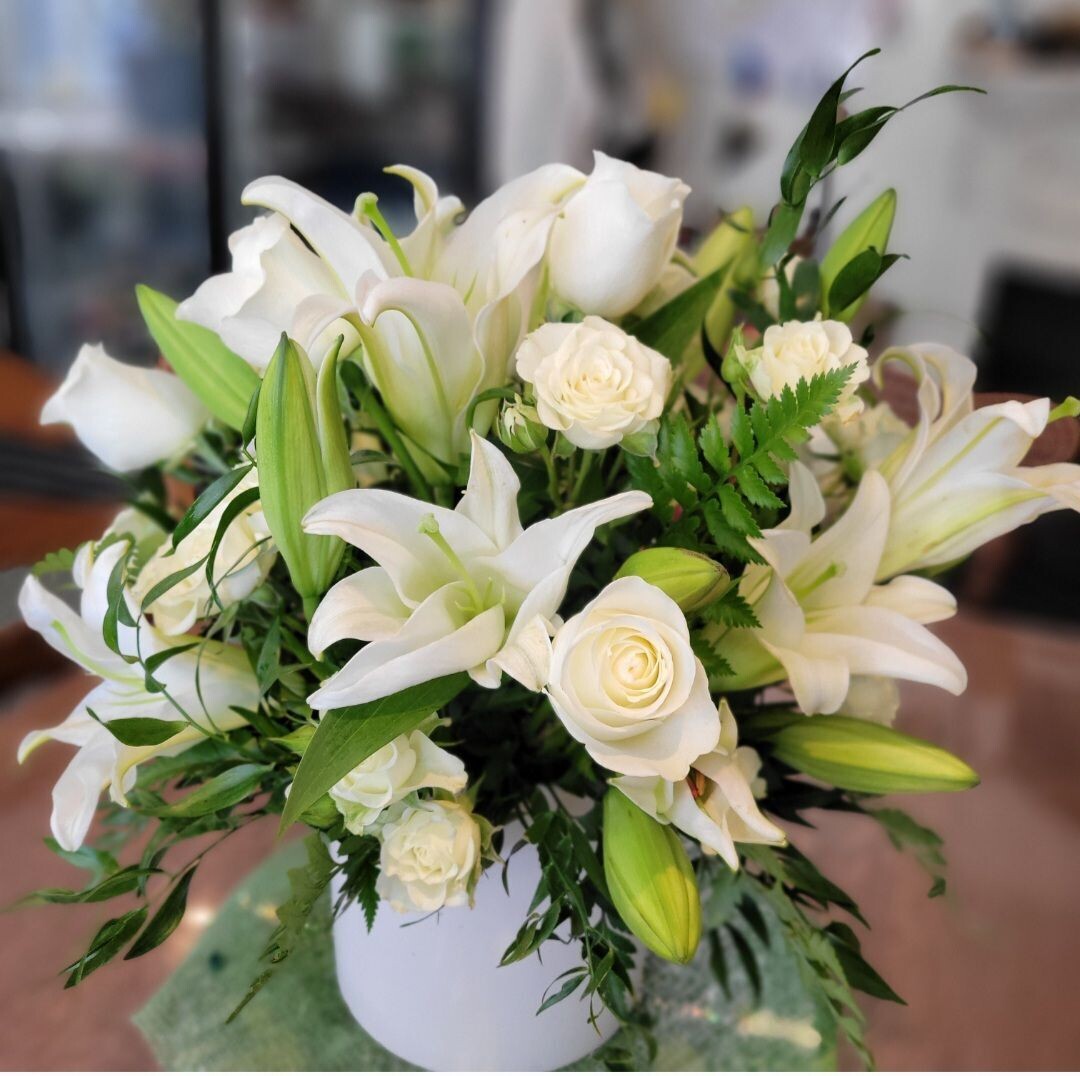 Tranquil Tribute:  White Lilies and Rose Sympathy Arrangement