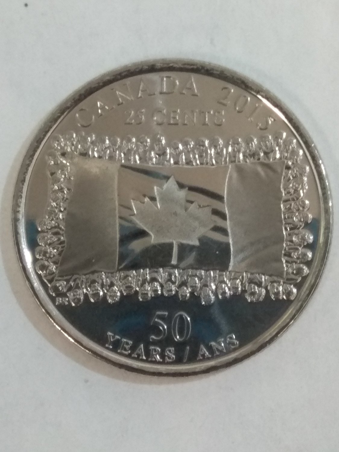 Канада. Елизавета II. 2015. 25 центов. 1965-2015. 50 лет флагу Канады. Fe-Ni 4.43 g. Proof-like