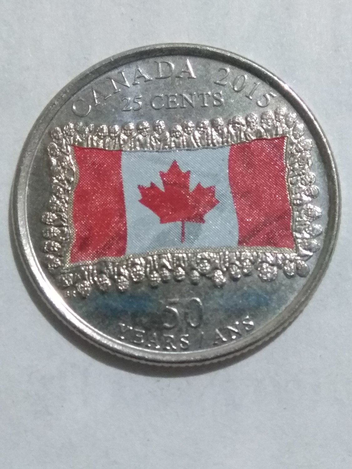 Канада. Елизавета II. 2015. 25 центов. 1965-2015. 50 лет флагу Канады. Цветной. Fe-Ni 4.430 g. UNC
