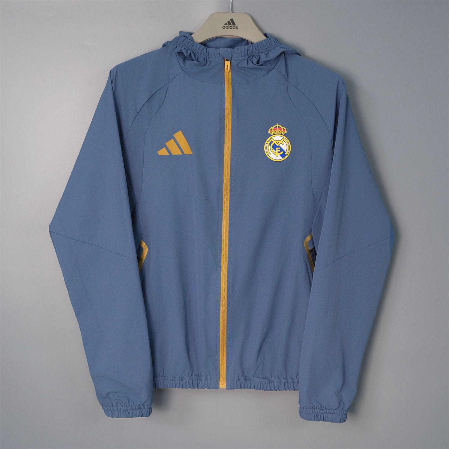Real Madrid 26/27 Hooded Windbreaker (Blue-Grey)