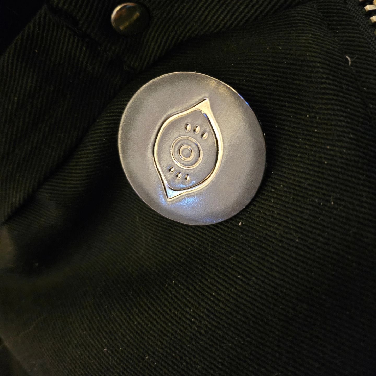 Paragons of the New Moon etched enamel badge