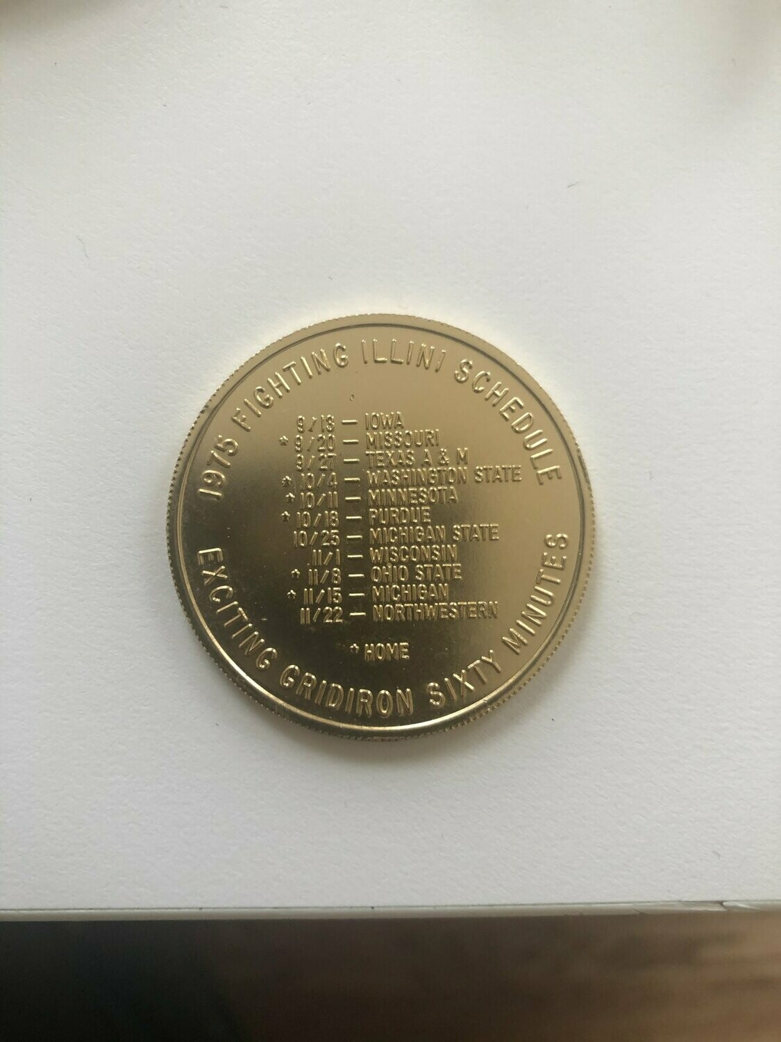 Item.D.39.1975 Illinois Football Schedule Coin