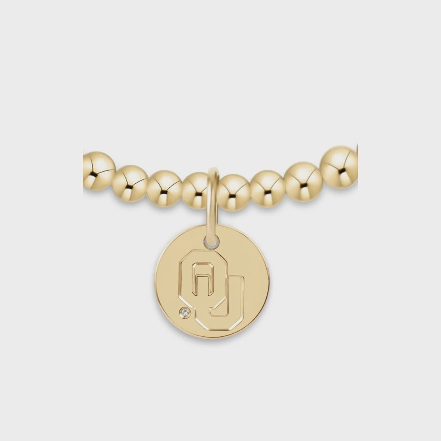 ECOLLEGIATE CLASSIC GOLD BRACELET 3MM OKLAHOMA DISC