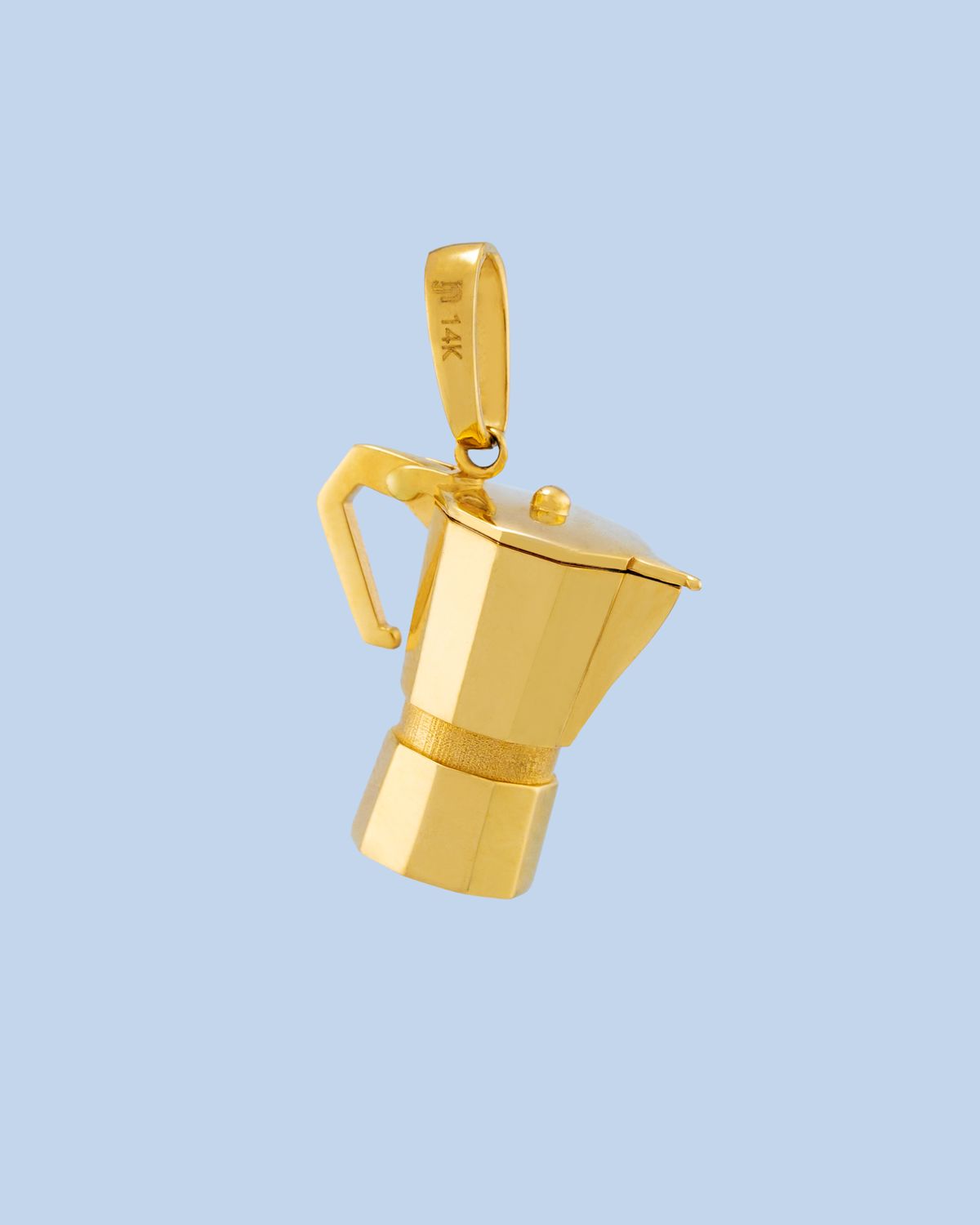 Dije Cafetera 14k
Peso 3.3g