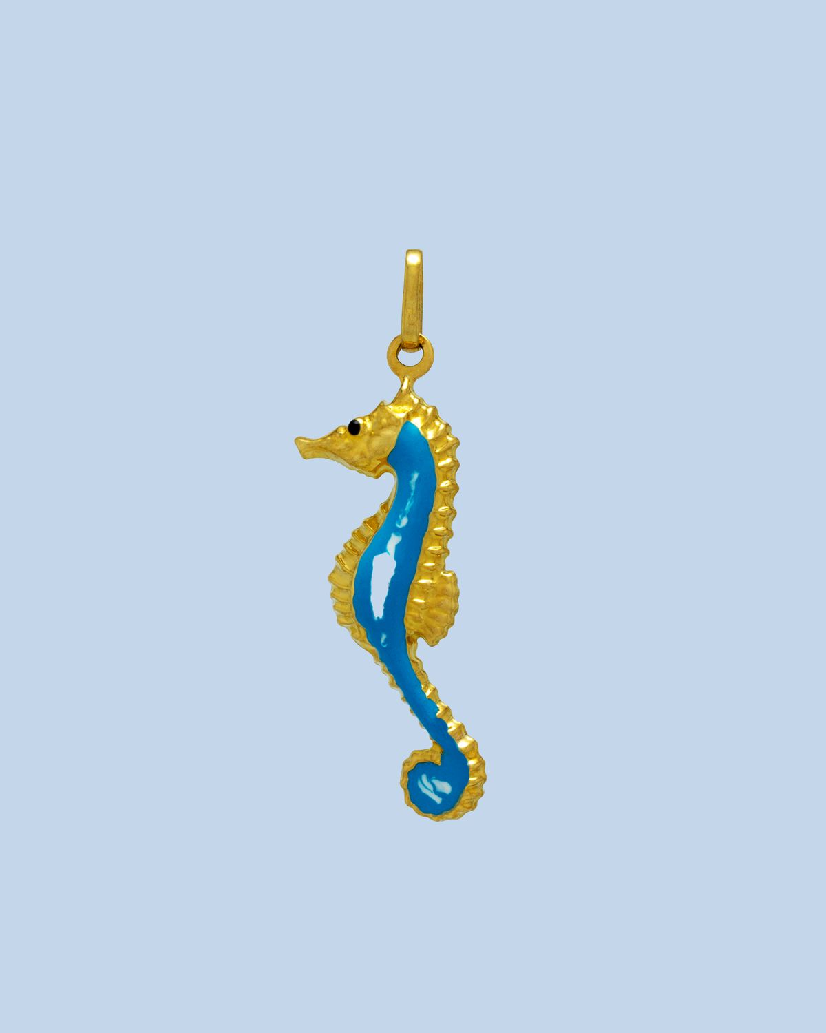Dije Caballito de Mar 14K
Dimensiones 25mm x 7mm
Peso 0.7g