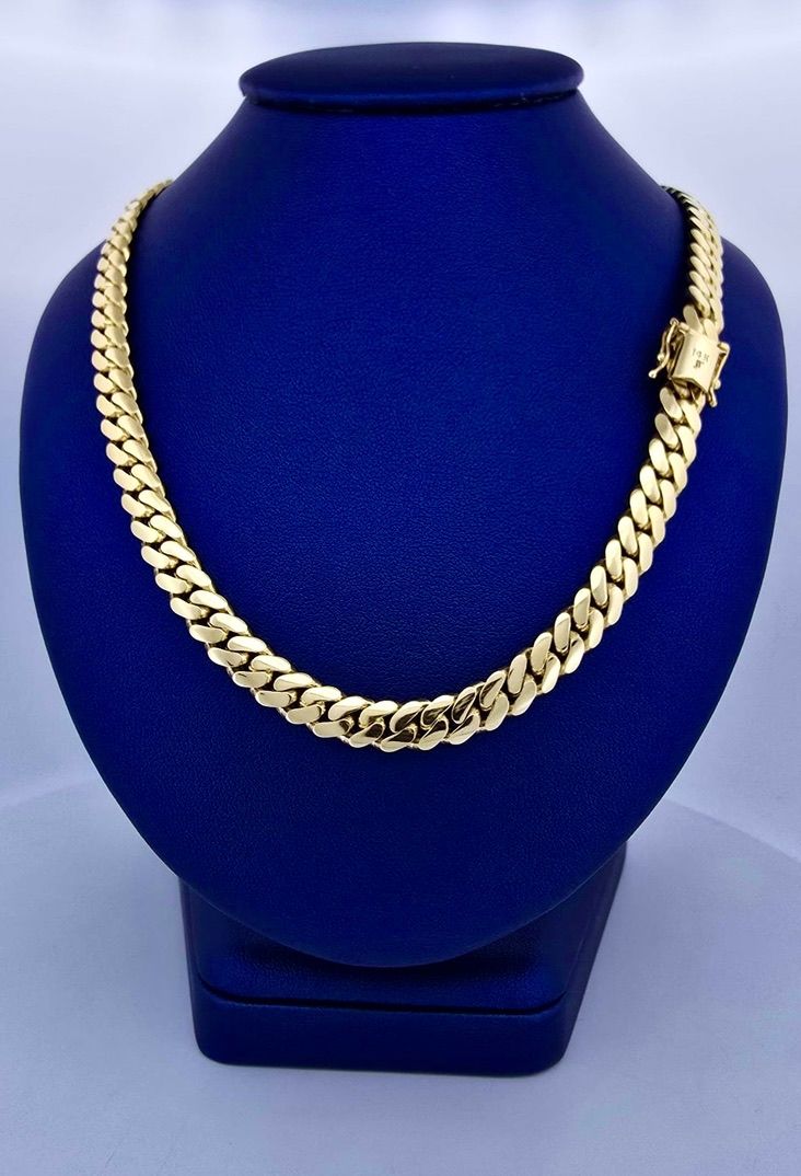 Cadena Cubana 14k  Dimensiones 22" x 7mm Peso 69.35g CA10009549