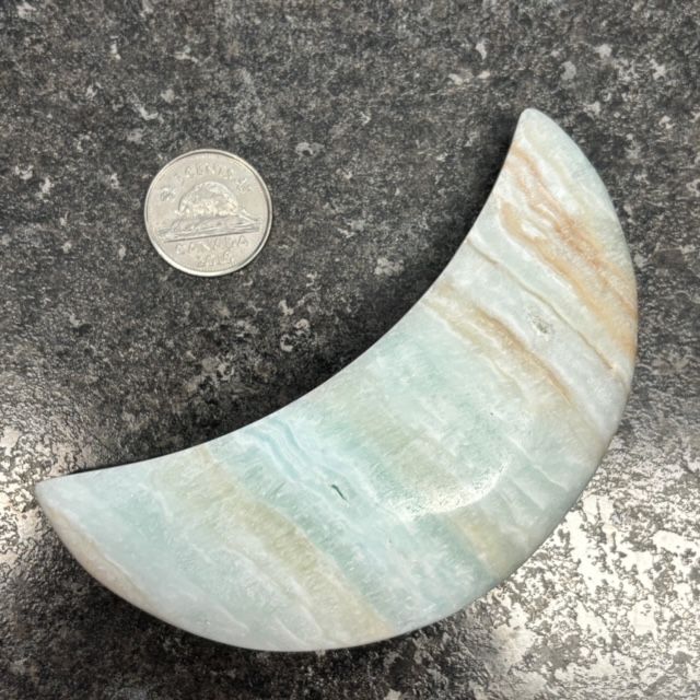 Caribbean Calcite Moon Palm Stone
