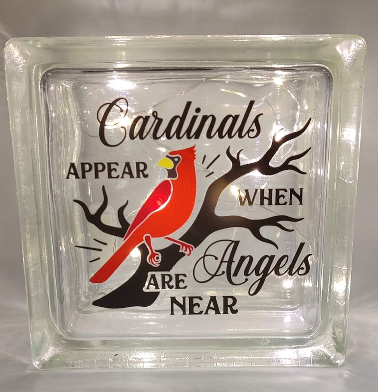 Cardinals Appear When Angels Are Near Glass Block