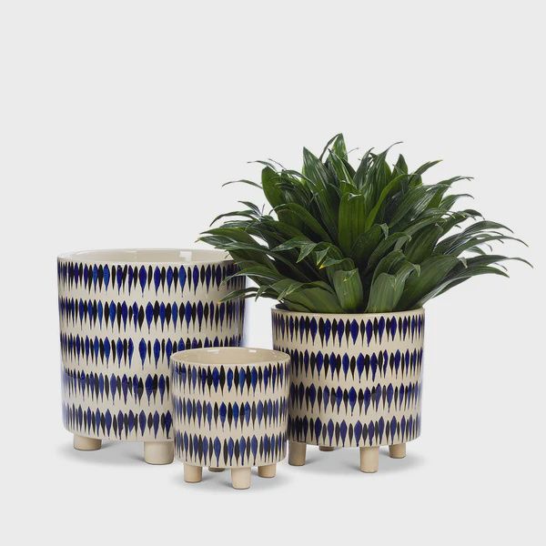 Blue and black stripe pot with legs