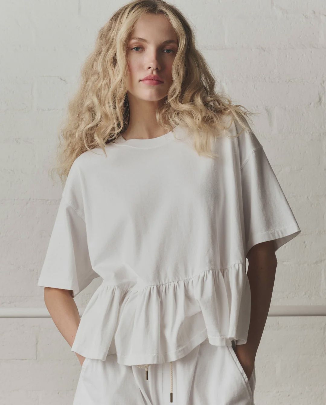 The Oversized Ruffle Peplum Tee