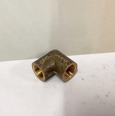 Brass elbow 1/4" Fi