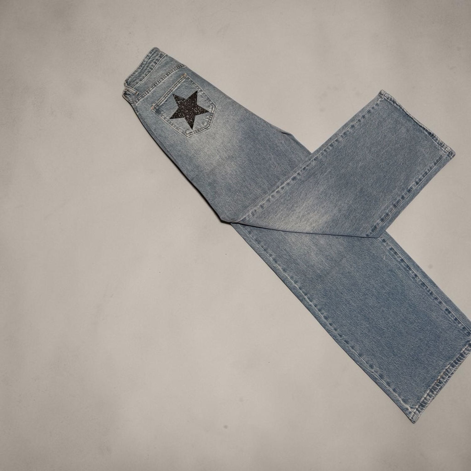 Jeans a palazzo con stella