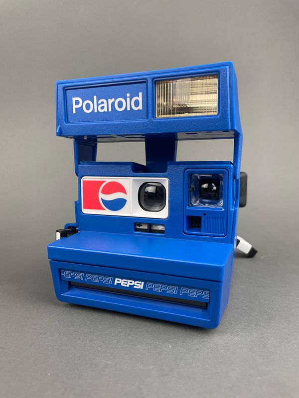 Retrospekt Pepsi One Step Polaroid