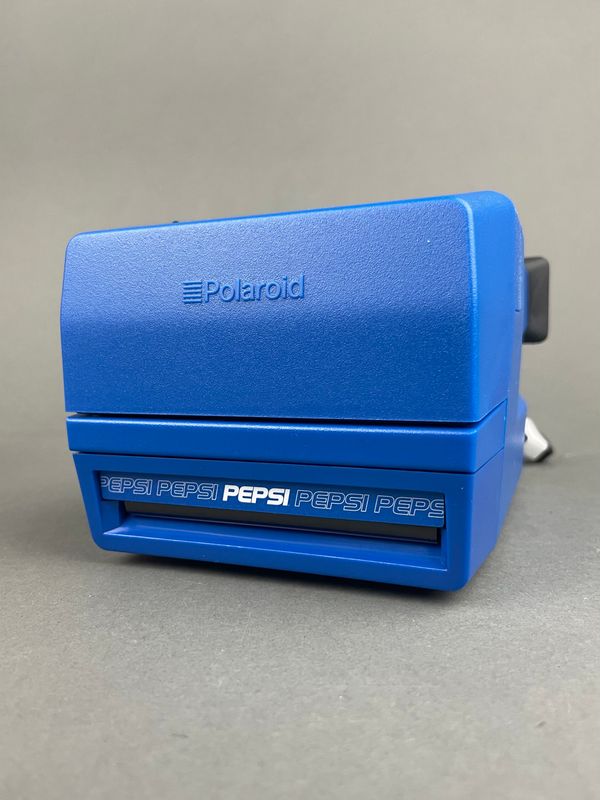Retrospekt Pepsi One Step Polaroid
