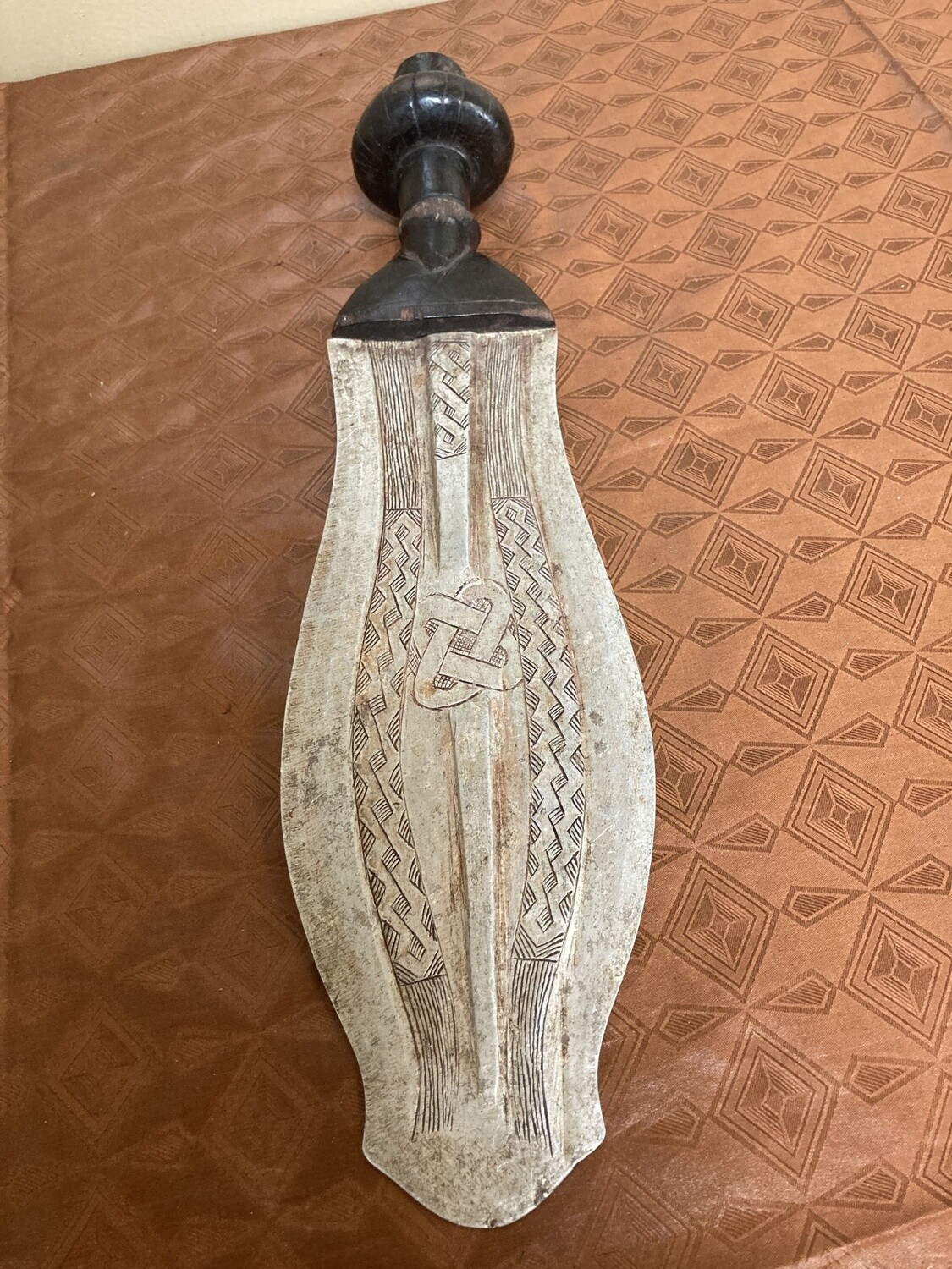 Kuba ceremonial dagger with wooden handle from Dem Rep of Congo. 14 ¾” in long.