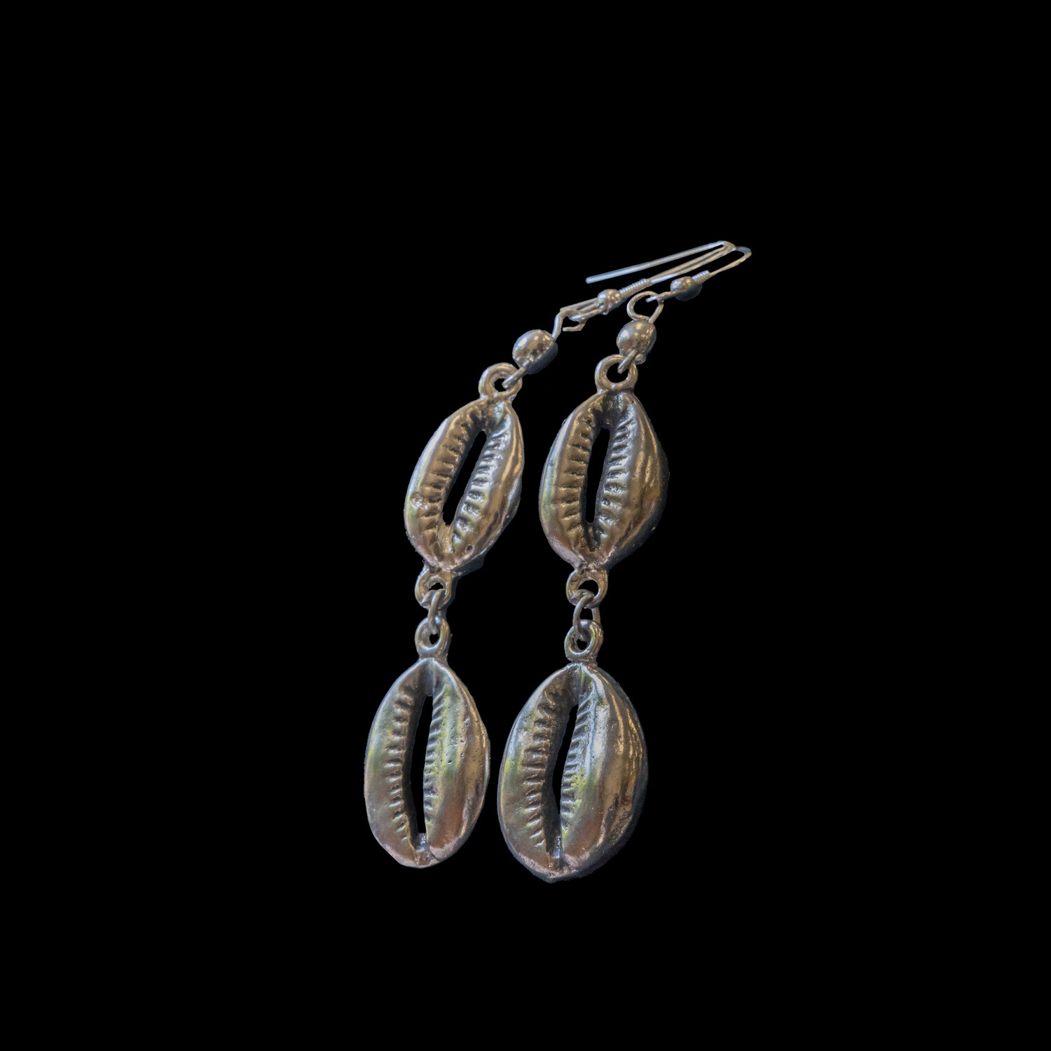 Double cowrie earrings.