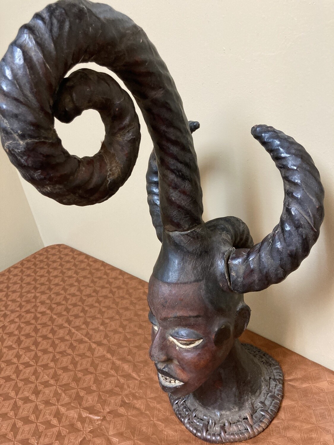 Ekoi (Ejagham): Ekoi wooden masks are covered with animal skin. These figures usually refer to cultural or war heroes. This piece was worn on the top of a woman&#39;s head. 20 1/4&quot; tall x 11 1/4&quot; W. Niger