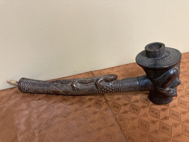 Kuba (bakuba): Wooden pipe, probably made by the Denguese who did much wood carvings as one of the 18 kuba tribes in the Democratic Republic of Congo. 16 1/4&quot; L x 5 1/4&quot; tall