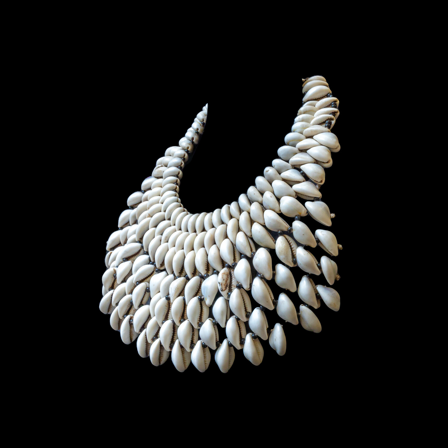 Authentic hand-made cowrie shell breast-plate necklace.