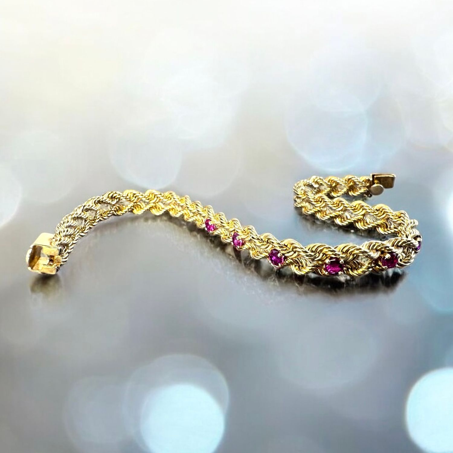 14kt Gold braided Rope Bracelet with 6 Pink Rubies