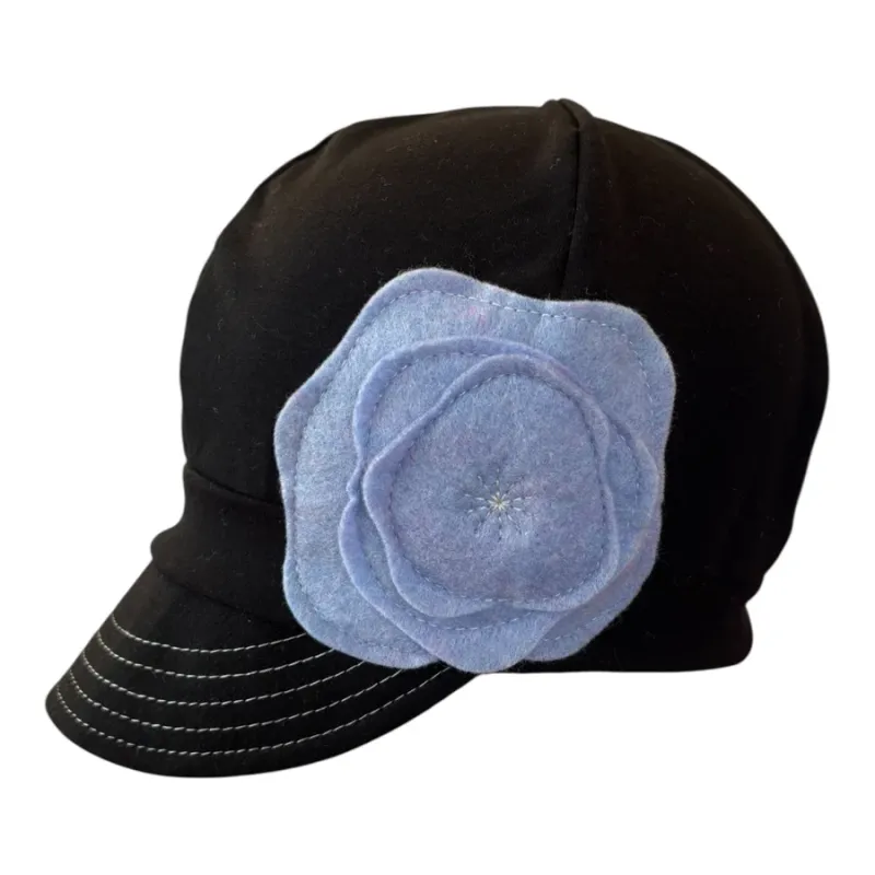 Soft Jersey cap with brim black with periwinkle blue flower on side