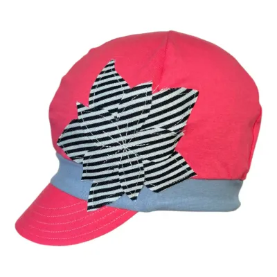 bright coral colored cap with striped flower on side