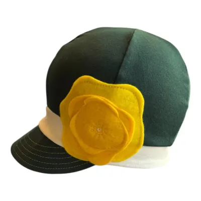 green stretchy cotton cap with white band and yellow flower on side