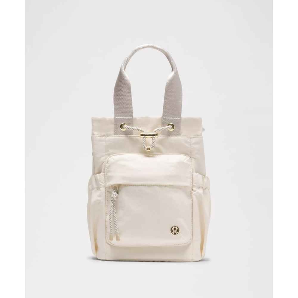 CONVERTIBLE DRAWSTRING BUCKET BAG