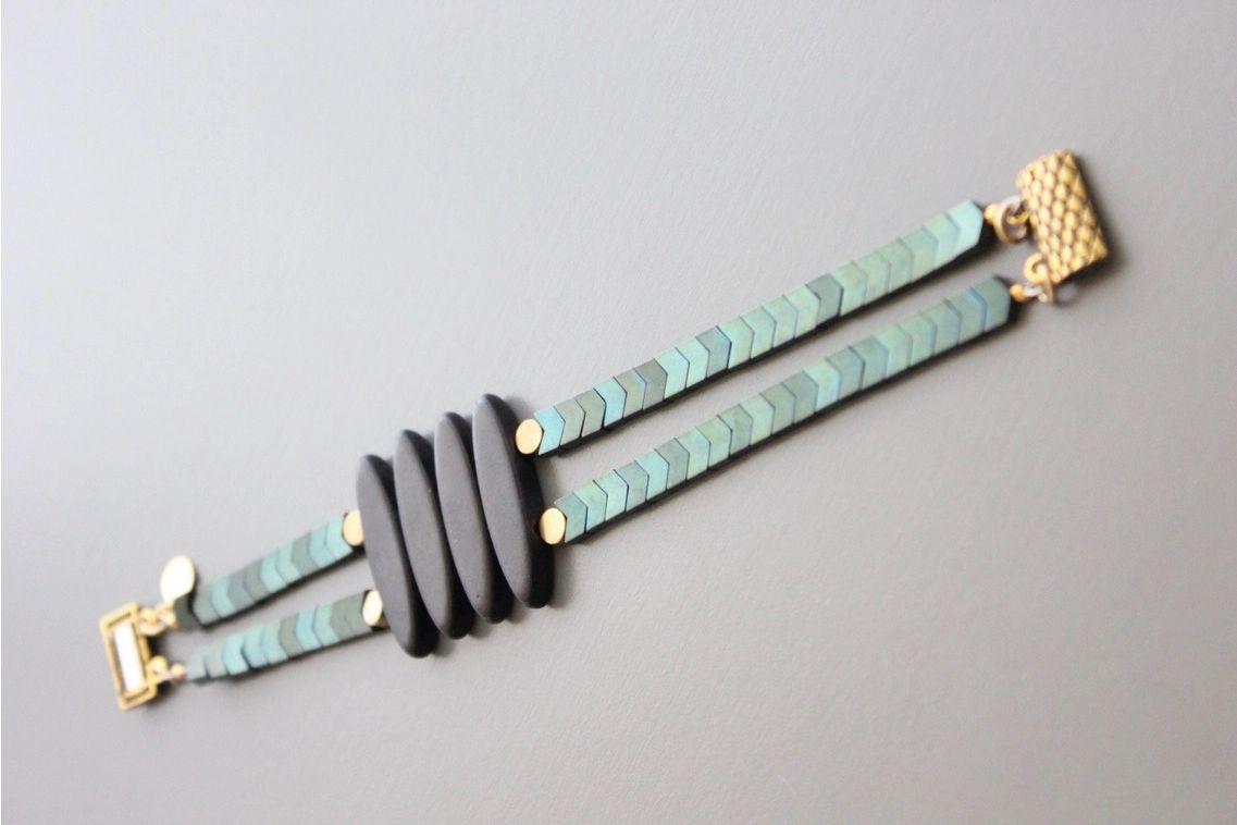 2 strand bracelet with hematite, magnesite, and brass beads