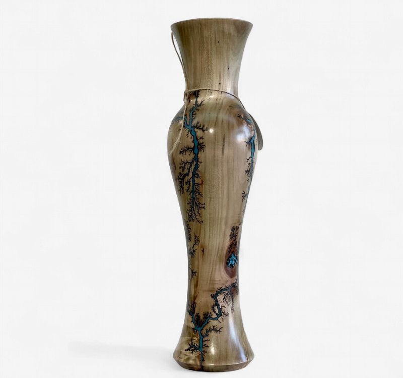“Vase- 16" Maple and glow Resin by Turned and Burned.”
