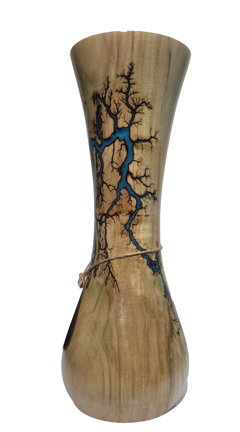 “Vase- 9.25" Maple and glow Resin by Turned and Burned.”