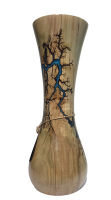 “Vase- 9.25" Maple and glow Resin by Turned and Burned.”