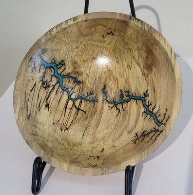 “Bowl- 7.5" Maple and glow Resin by Turned and Burned.”