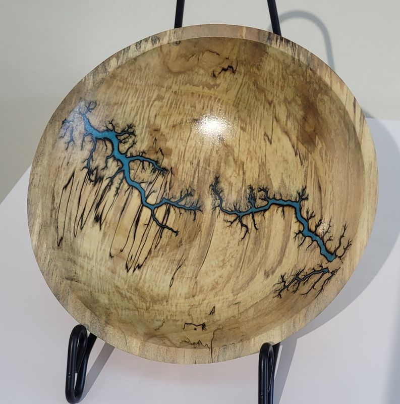 “Bowl- 7.5" Maple and glow Resin by Turned and Burned.”
