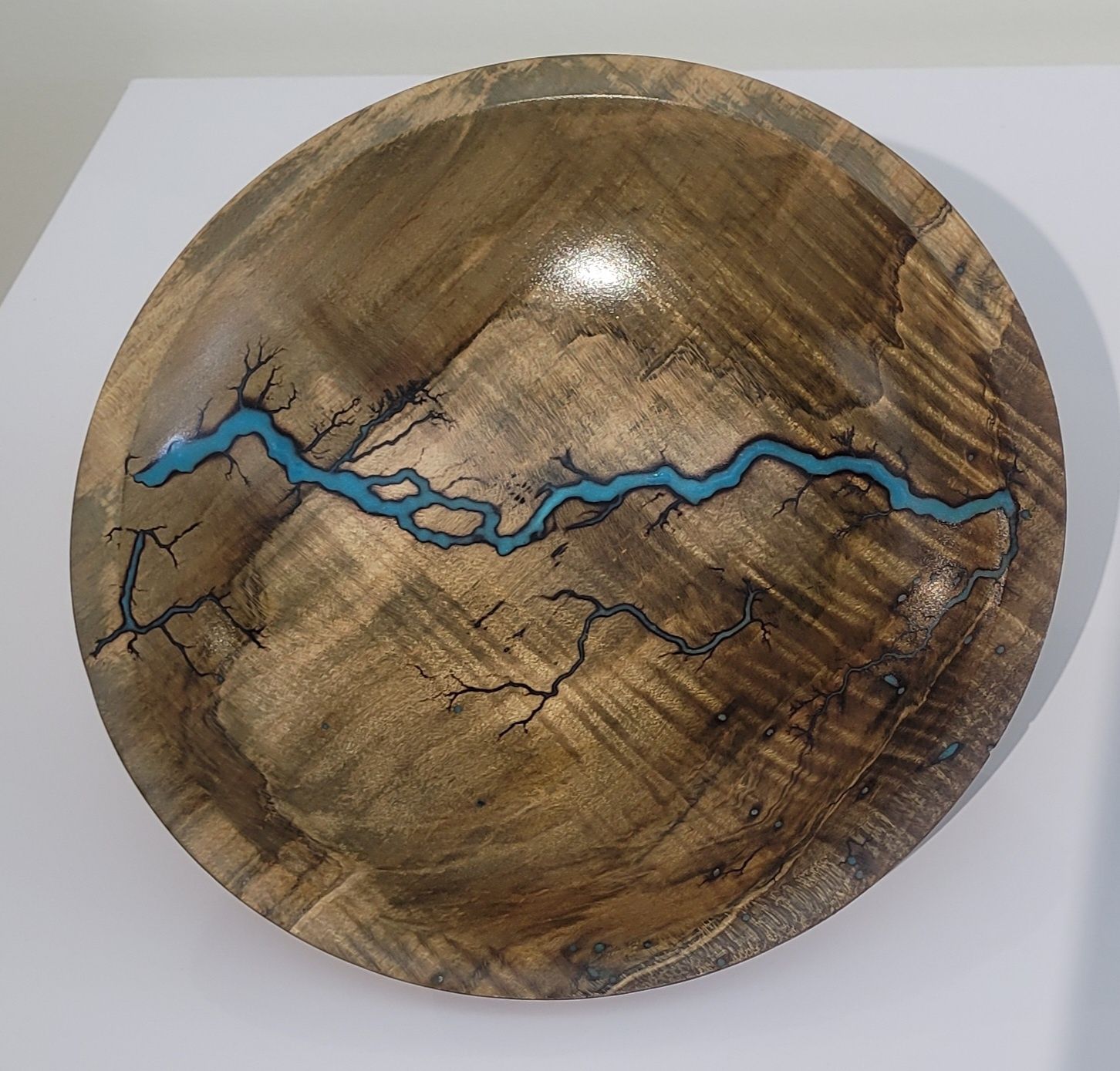 “Bowl- 7.25" Dark Maple and glow Resin by Turned and Burned.”