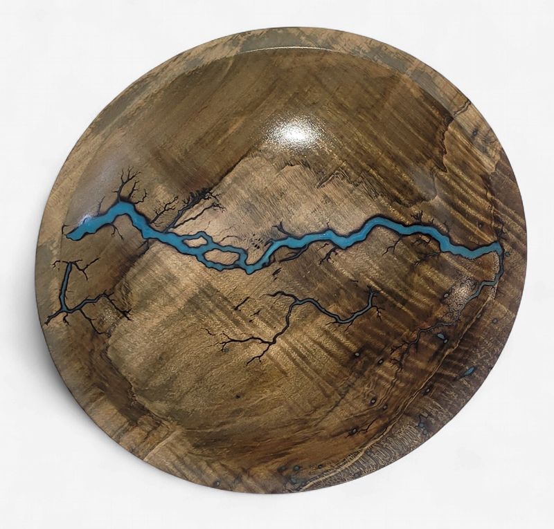 “Bowl- 7.25" Dark Maple and glow Resin by Turned and Burned.”