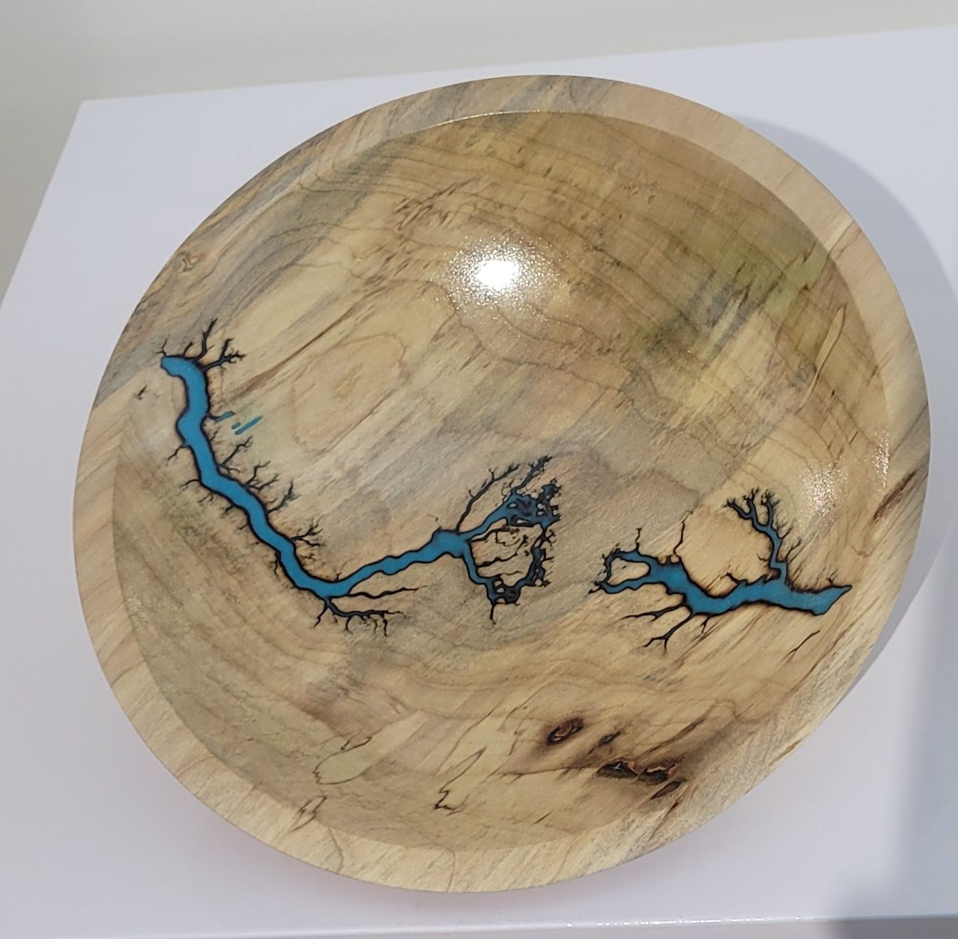“Bowl- 7.5" Shallow Maple and glow Resin by Turned and Burned.”
