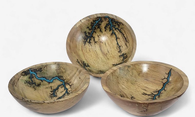 “Bowl- 5.5" Maple and glow Resin by Turned and Burned.”