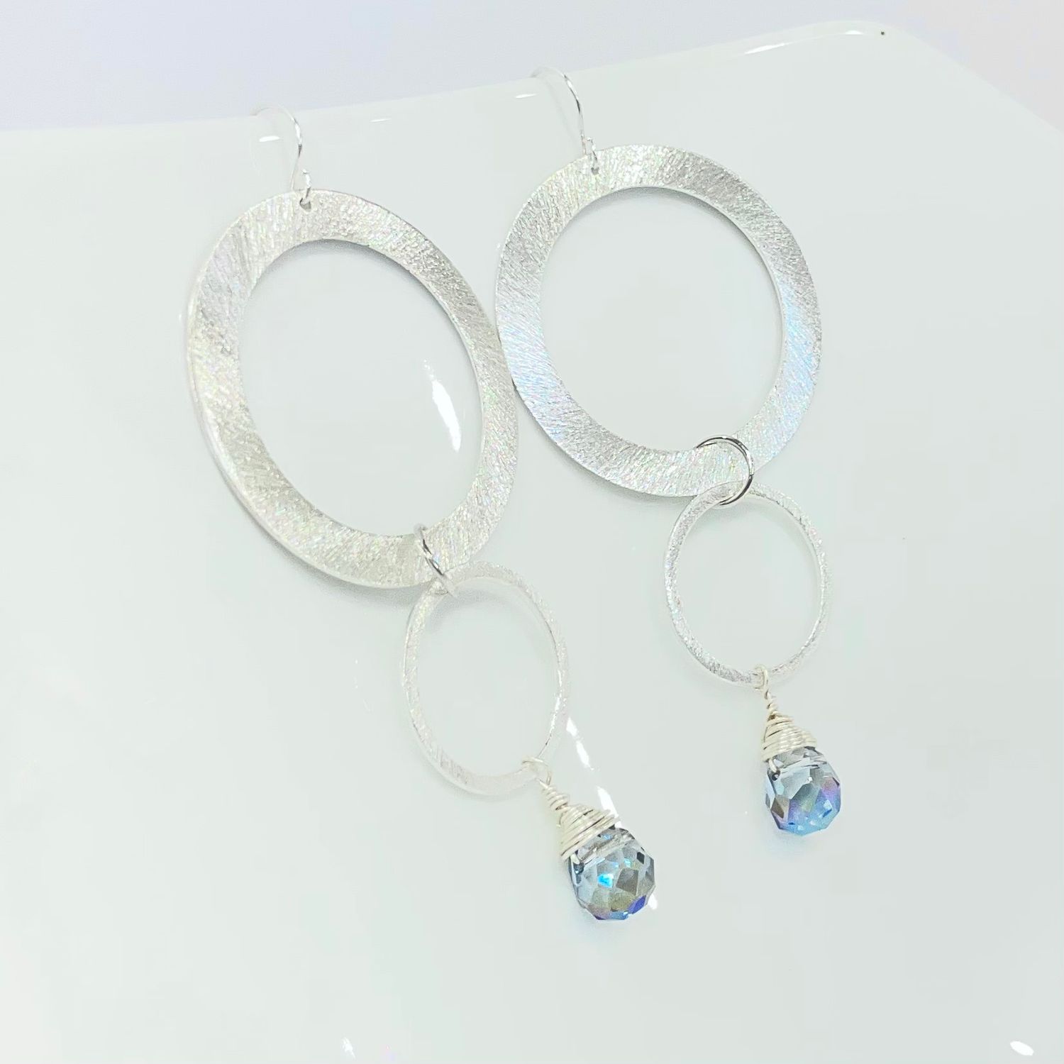 Eva Earrings with crystal drop, Finish: Brushed Silver/sterling Silver ear wires, Stone: Blue Crystal
