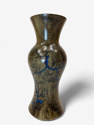 10.25” Magnolia vase with glow in the dark resin by Turned and burned.